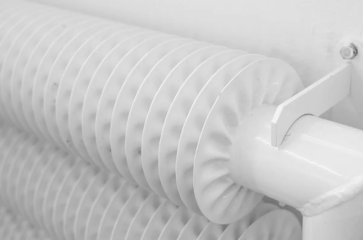 Close-up of a white column radiator